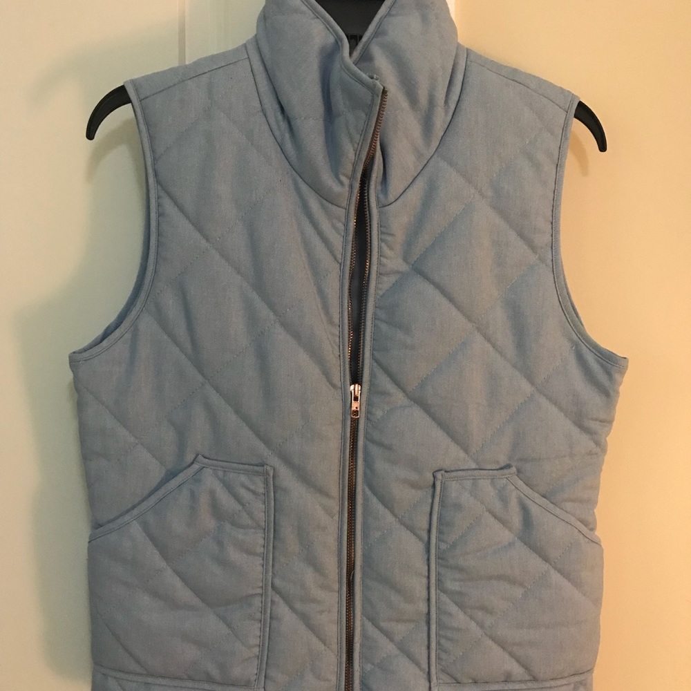 Pale blue puffy vest